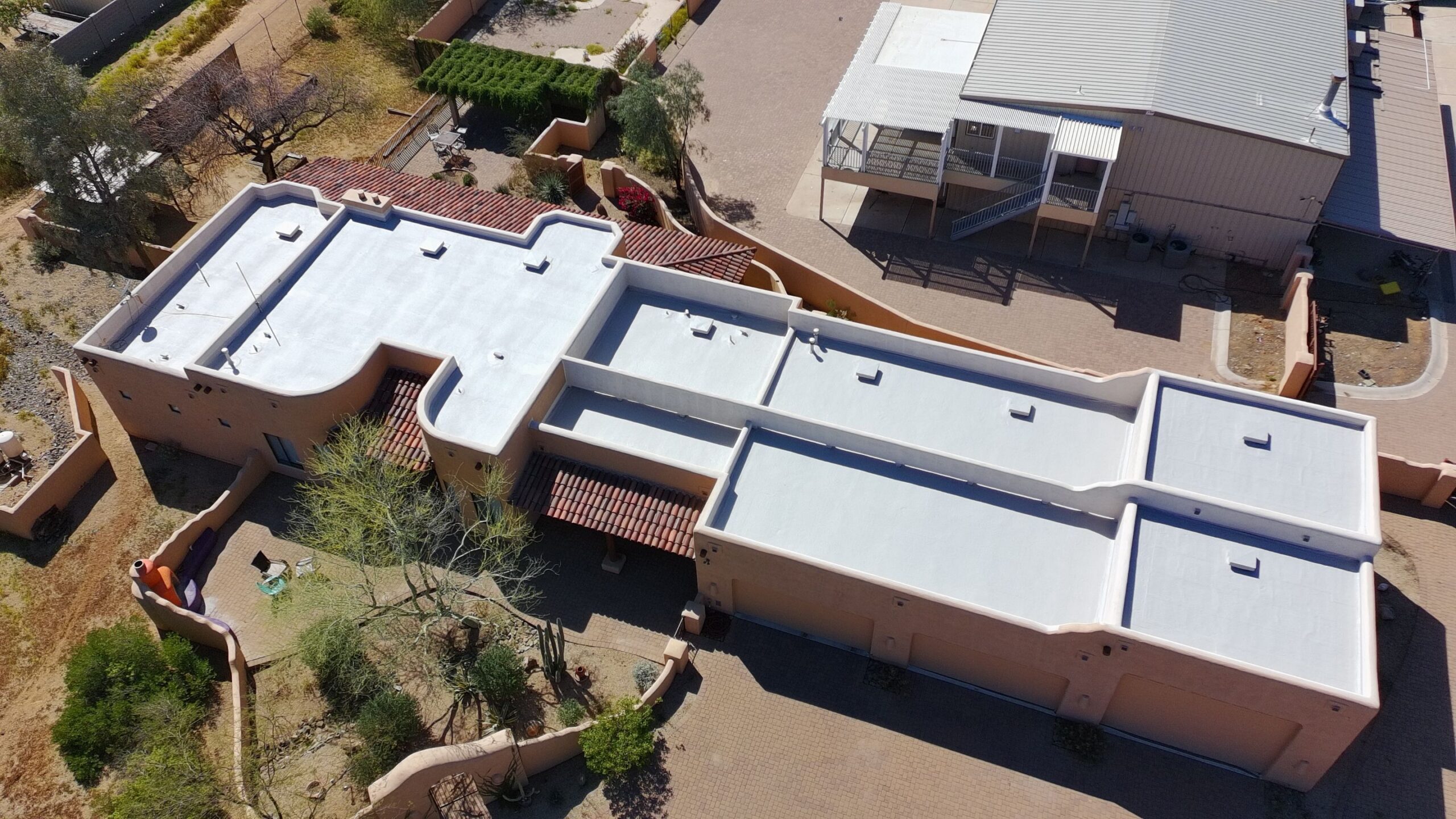 Completed flat foam roof recoat project in Phoenix, Arizona